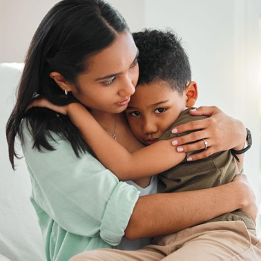 Mom comforting her son