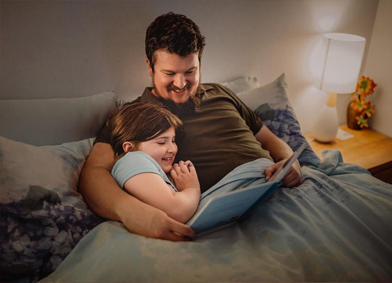 Dad reading a story to his child